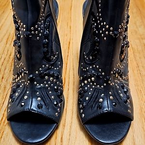 Trade or make offer on Embellished black open toe, open back heels.